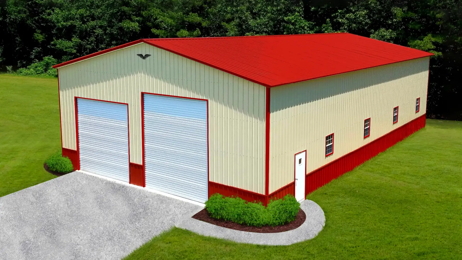 Finished steel building with red roof and landscaping